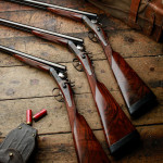 A SET OF 3 JAMES PURDEY 12g HAMMER EJECTOR GUNS.