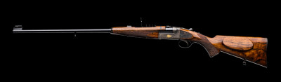 A Westley Richards .303 Hand Detachable Lock Rifle.