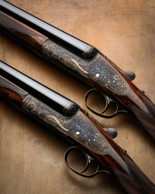 Westley Richards Round Action Sidelocks. A Pair of 20g Single Trigger Guns.