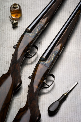 A Pair of Westley Richards 20g Hand Detachable Lock Guns with single selective triggers. Engraved by Rashid Hadi.