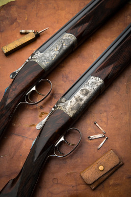 Two David McKay Brown 28g Over Under guns.