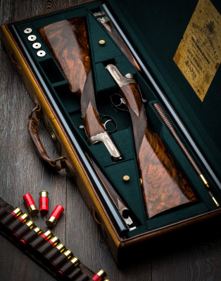 A Pair of Westley Richards Lightweight, 12g, Single Selective Trigger, Droplock Game Guns.