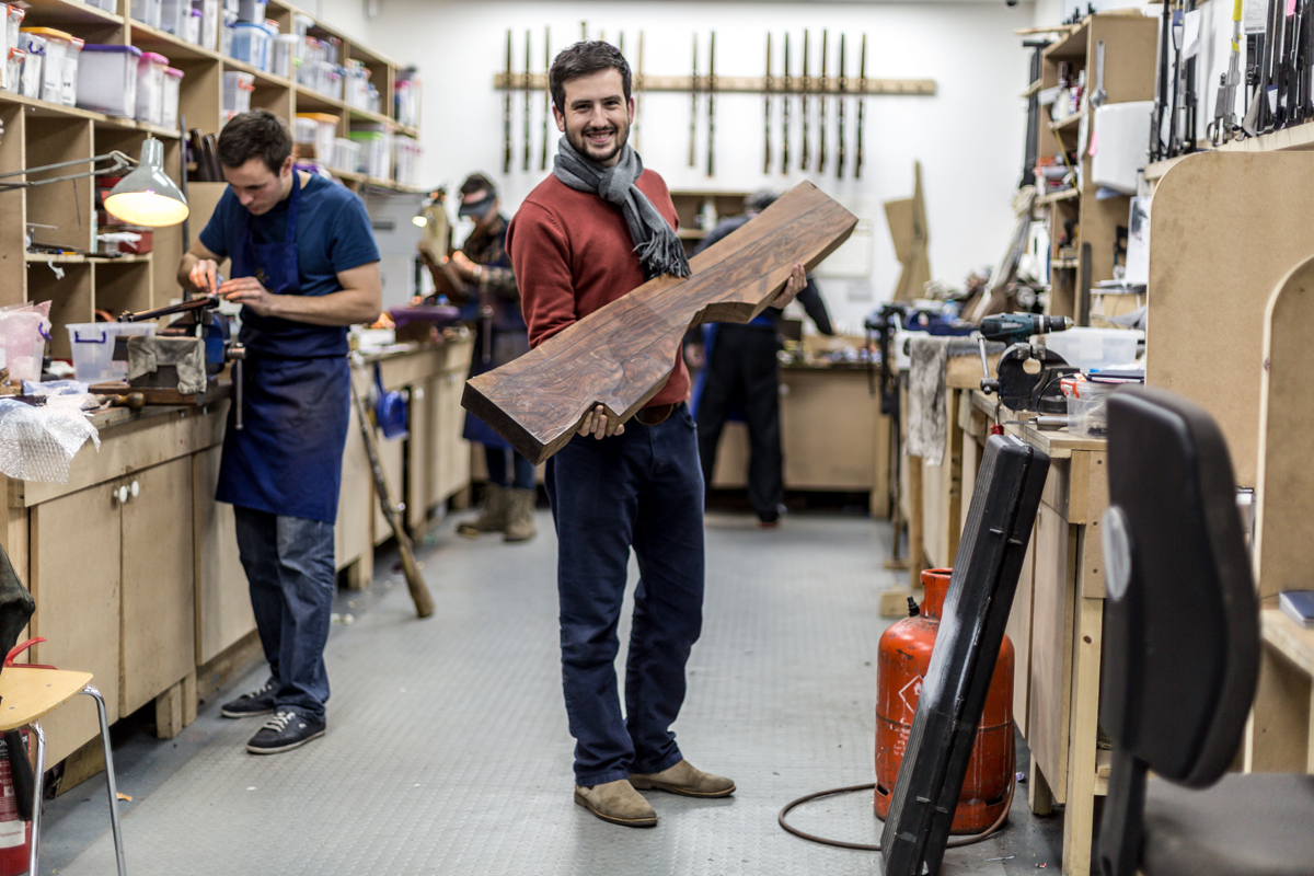 rigby-heritage-rifle-marc-newton-of-rigby-with-the-sci-donation-rifle-stock-blank-in-the-rigby-workshop-where-the-gun-will-come-to-life
